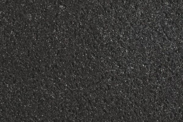 Absolute Black Brushed — natural stone slab for custom countertops and tables