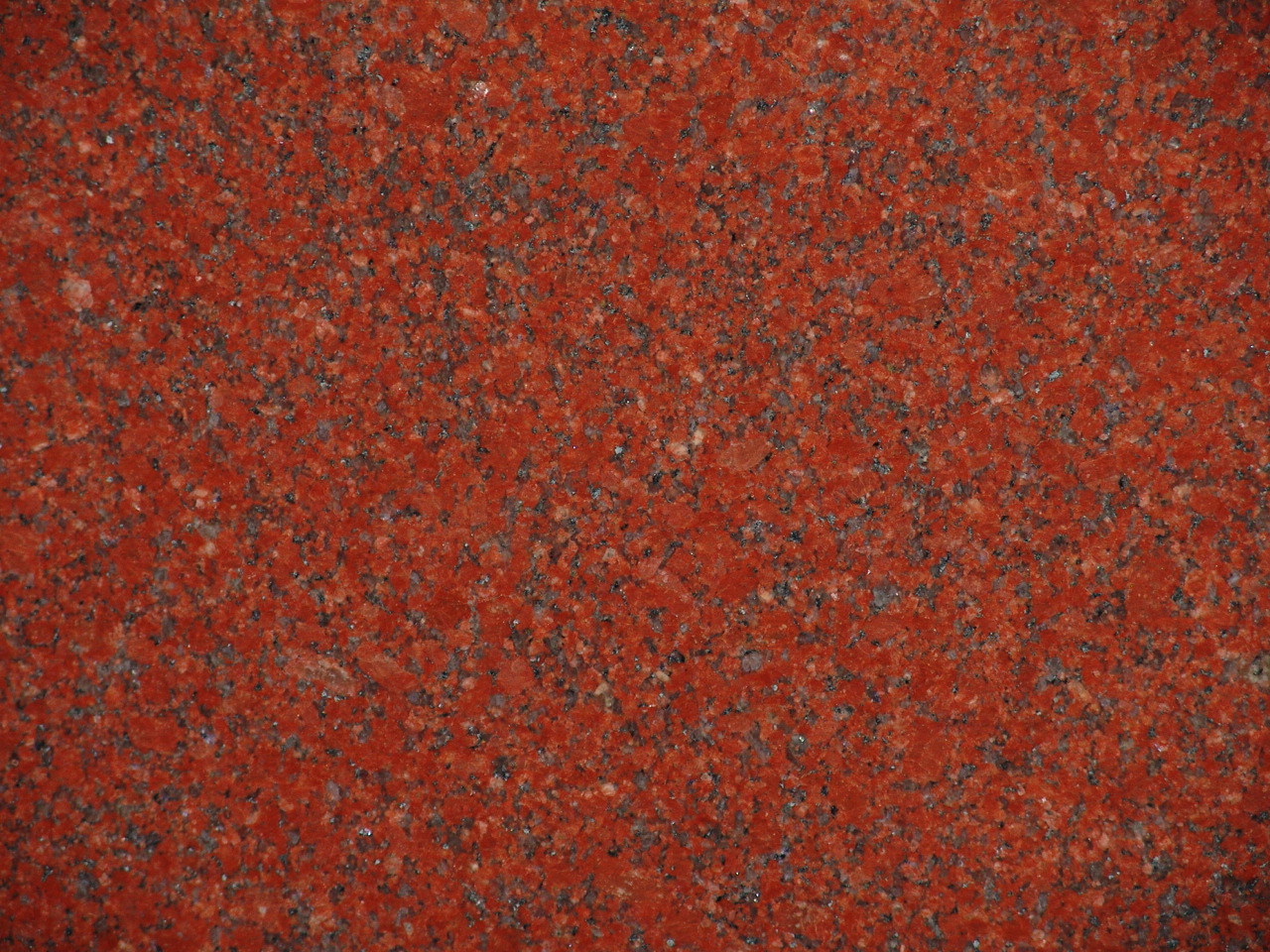 Imperial Red — natural stone slab for custom countertops and tables